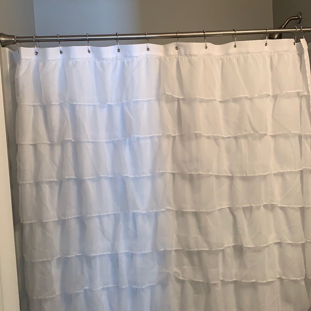 White ruffled shower curtain